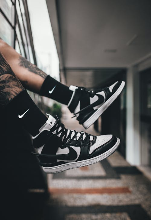 Nike Dunk High Retro Shoes with Black Nike Socks on Legs
