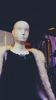 Chic mannequin draped in elegant clothing at a fashion boutique, highlighting contemporary trends.