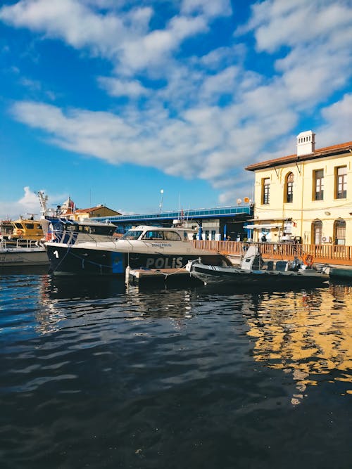 White and black Boat on Dock