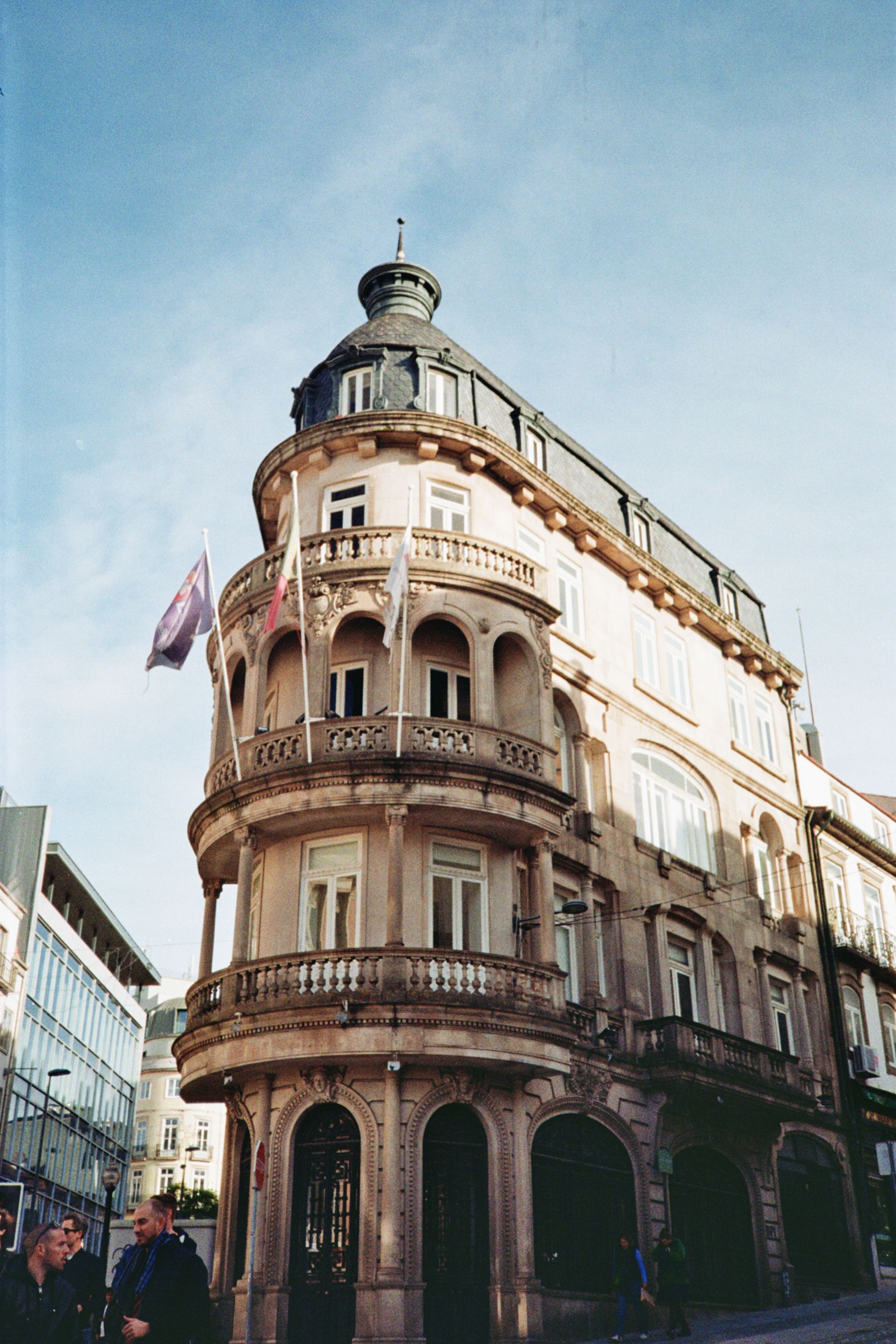 Historic building with intricate facade in Porto city center, showcasing European architectural charm.