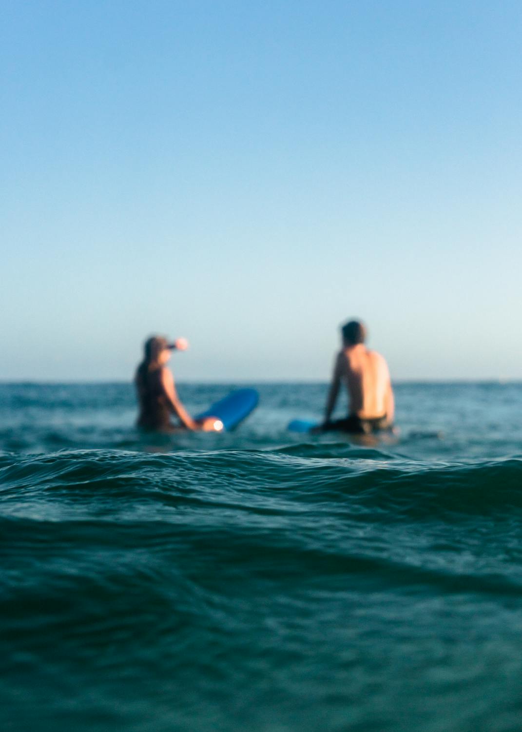 Two Person Riding Blue Bodyboard · Free Stock Photo