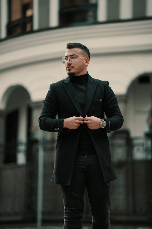Portrait of a Male Model Wearing an Elegant Black Jacket