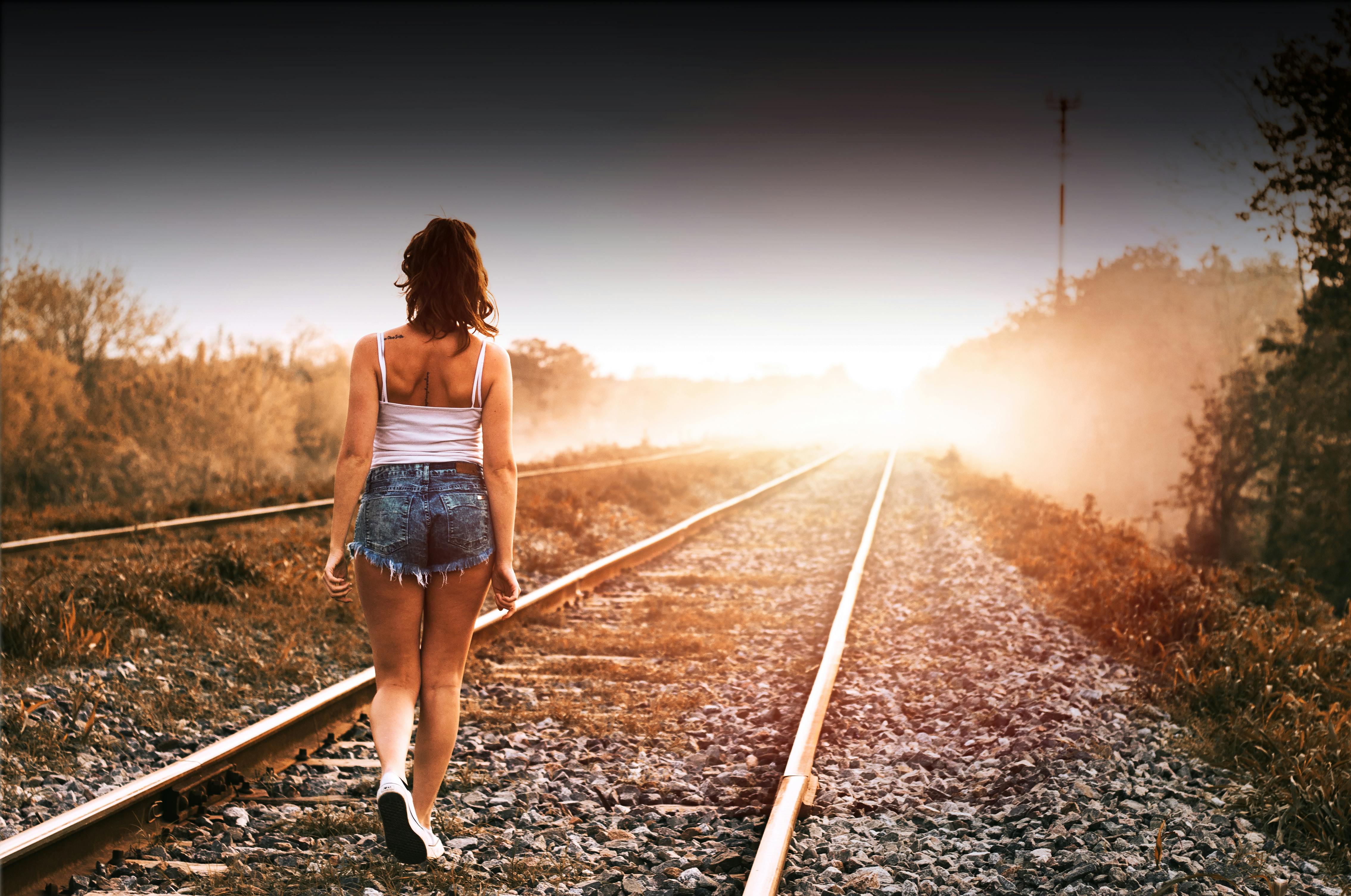 Free stock photo of girl, golden sunset, railway