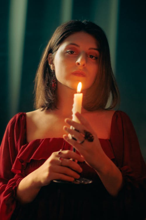 Woman Holding Candle