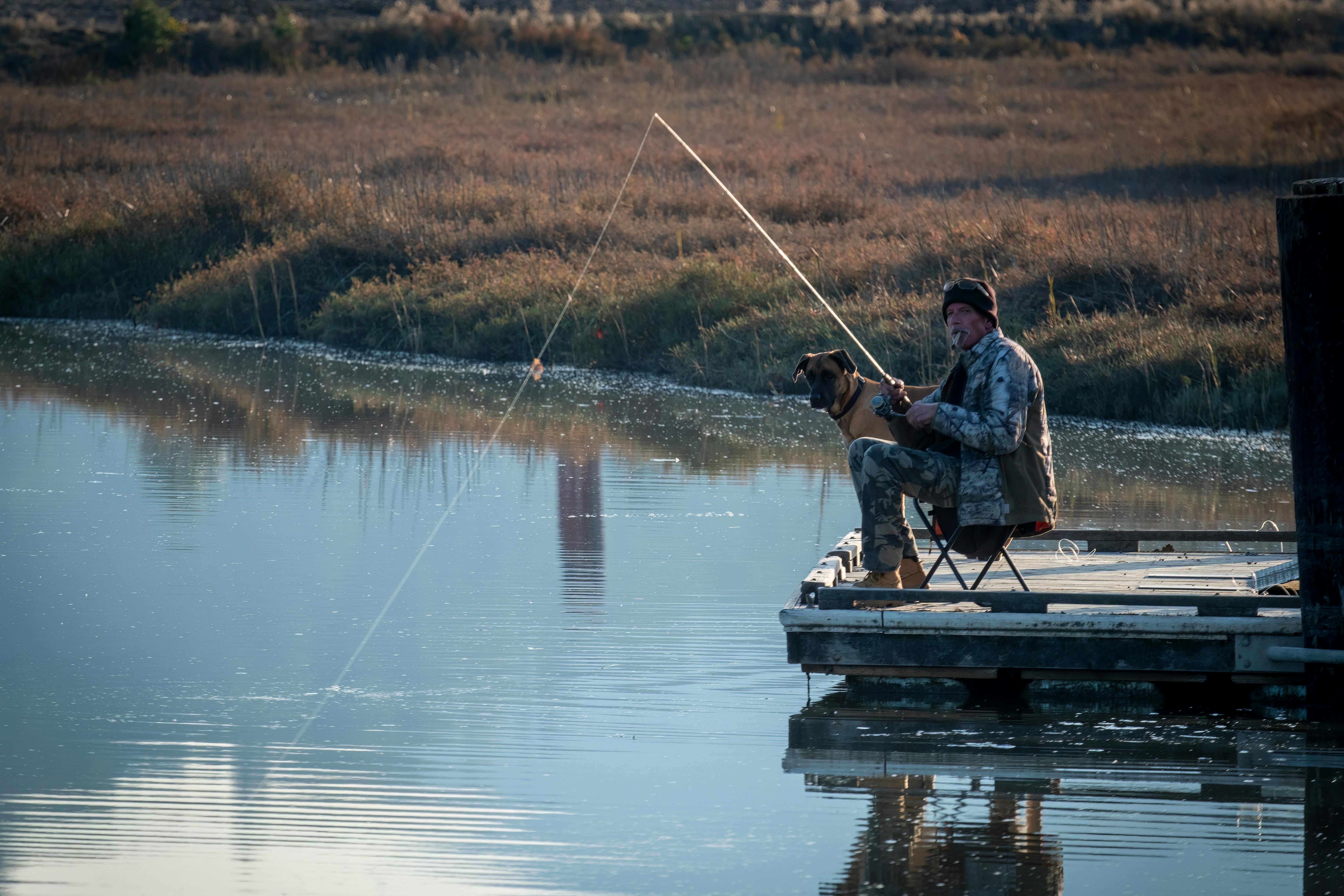 Man Fishing in Lake · Free Stock Photo