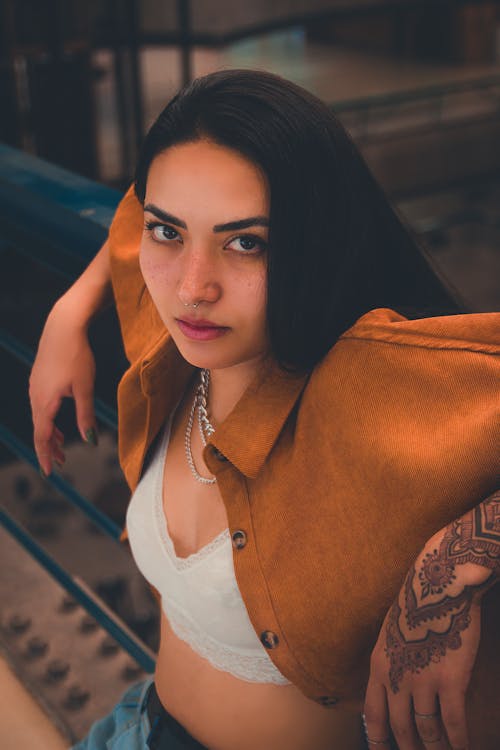 Woman with Black Hair and Tattoo