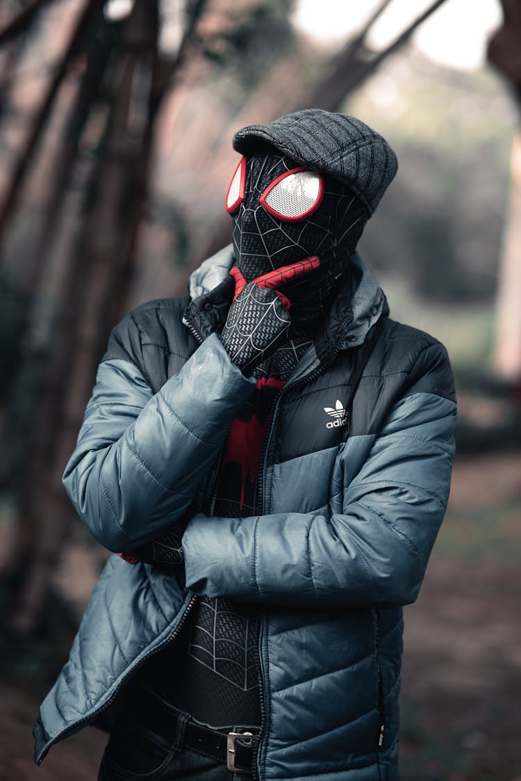 Person Wearing Jacket On Spider Man Costume