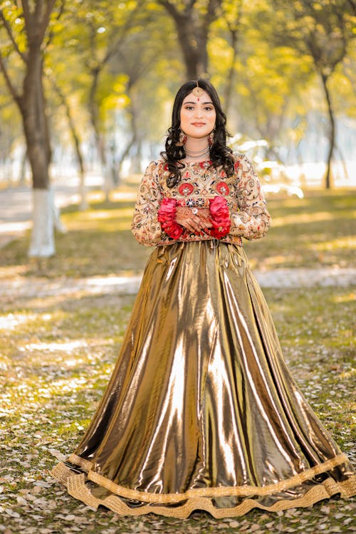 Woman in Traditional Clothing at Park