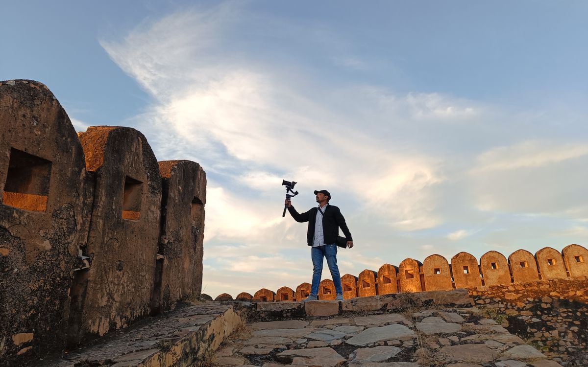 Indian content creator filming with a gimbal
