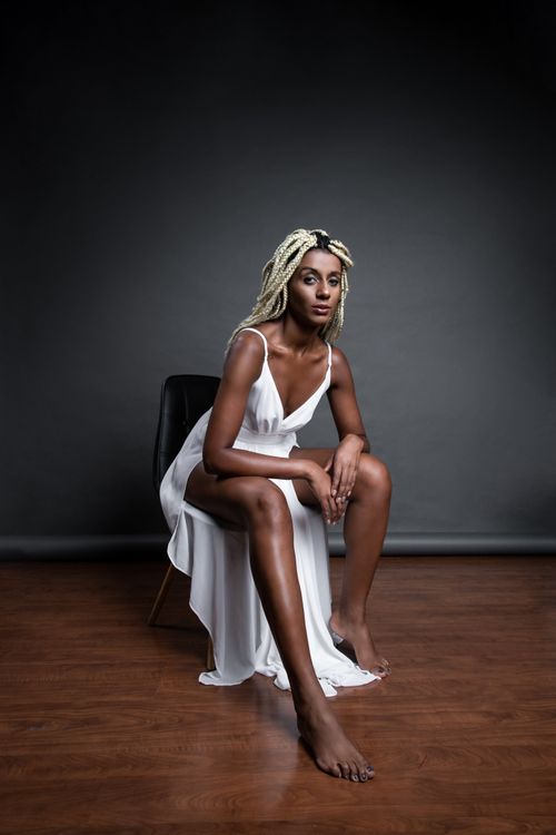 slit dress sitting on floor poses photos How to Sit in A Dress with A Slit