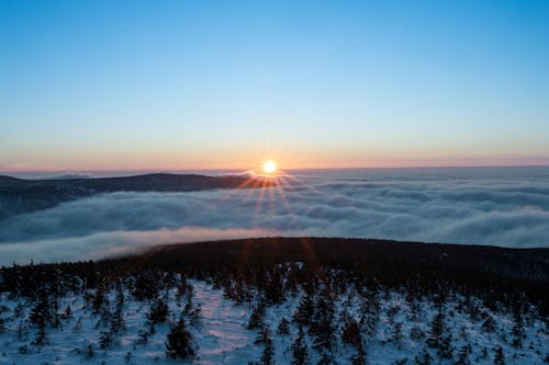 Aerial Photography of Sea of Clouds during Golden Hour