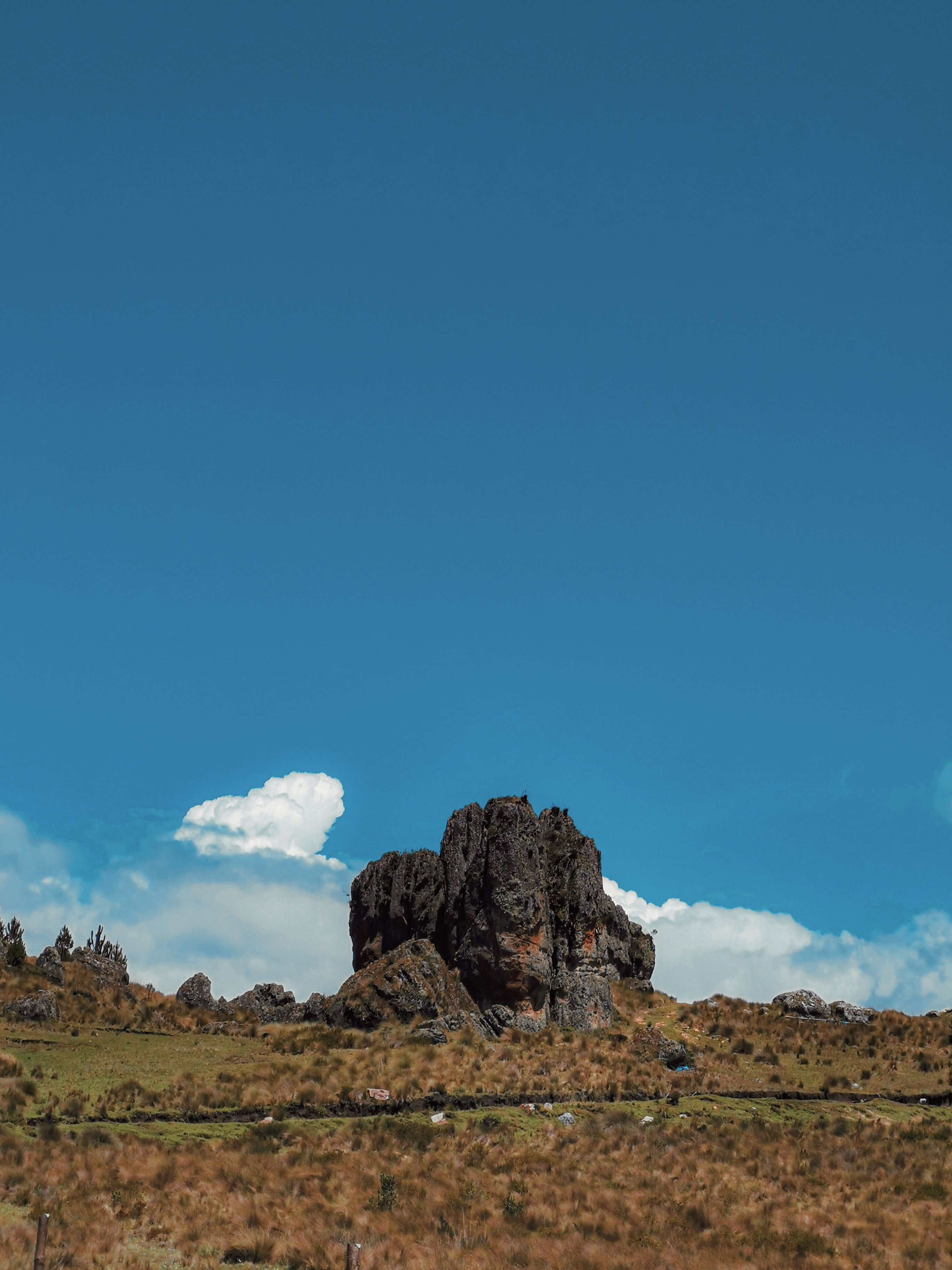 Clear Sky over Rock Formation · Free Stock Photo
