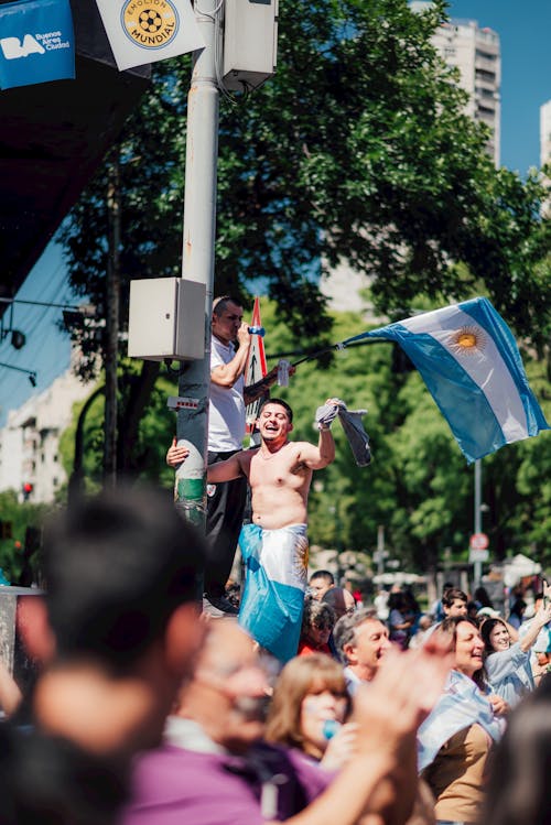 Free Crowd with Flags on Street in Argentina after World Cup Stock Photo