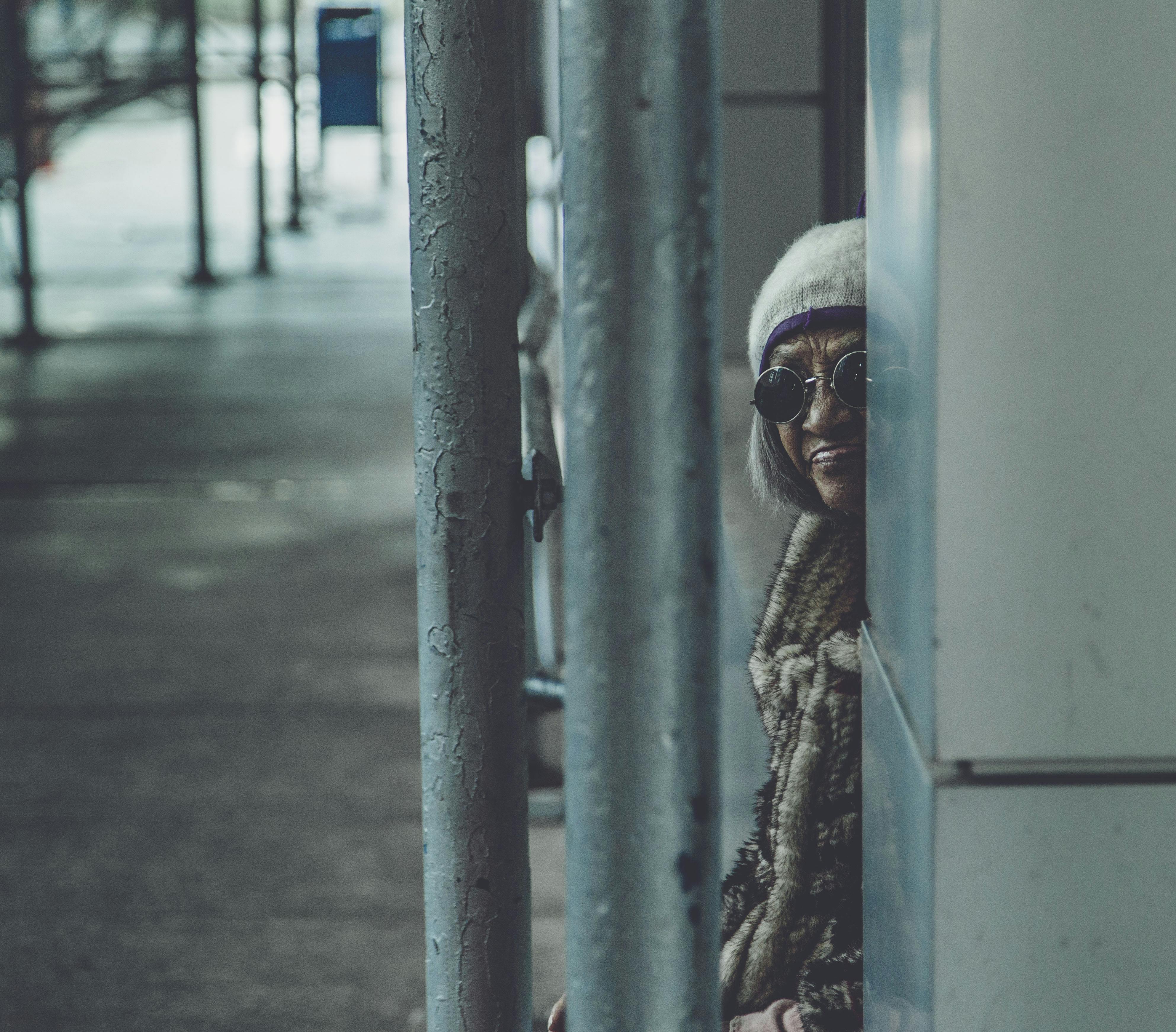 Person Leaning On Wall · Free Stock Photo