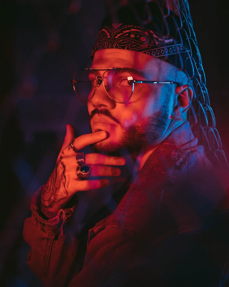 Portrait Of Man In Red Lighting