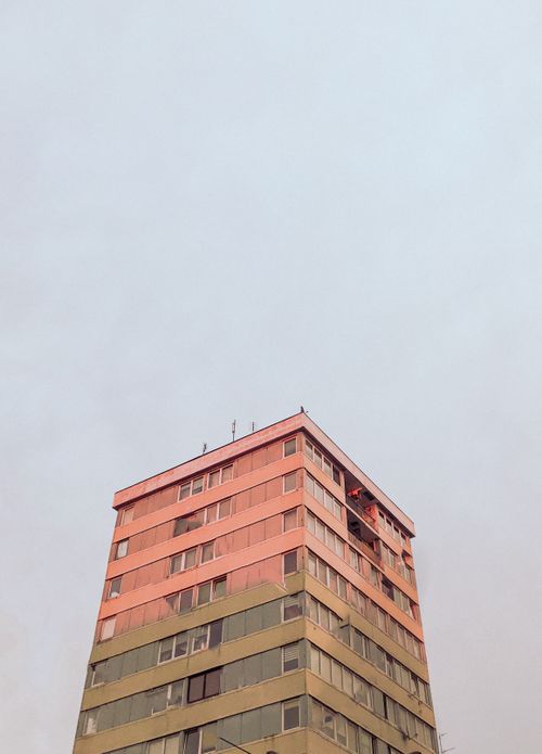 Free A vertical shot of a modern residential building in Wrocław against a clear sky. Stock Photo