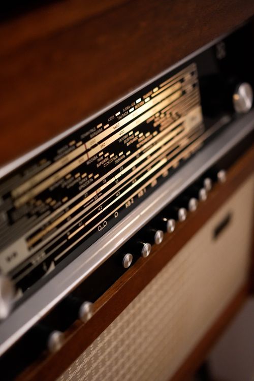 Free Detailed close-up of a vintage radio tuner dial with a classic design, emphasizing nostalgia. Stock Photo