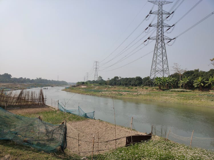 Electric Towers Near A Lake