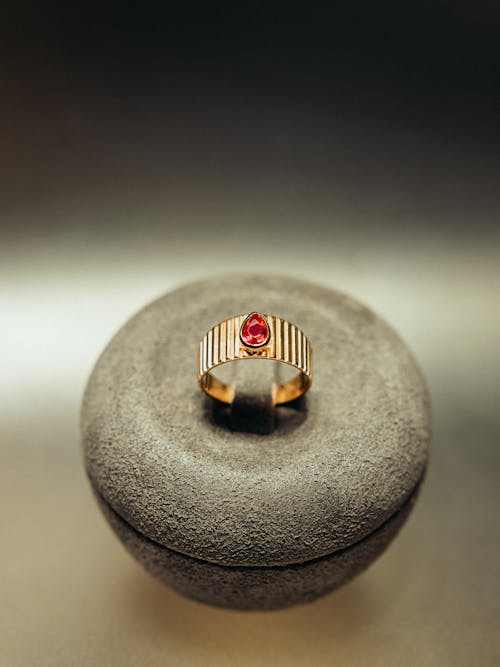 Ring with Red Stone on Rock