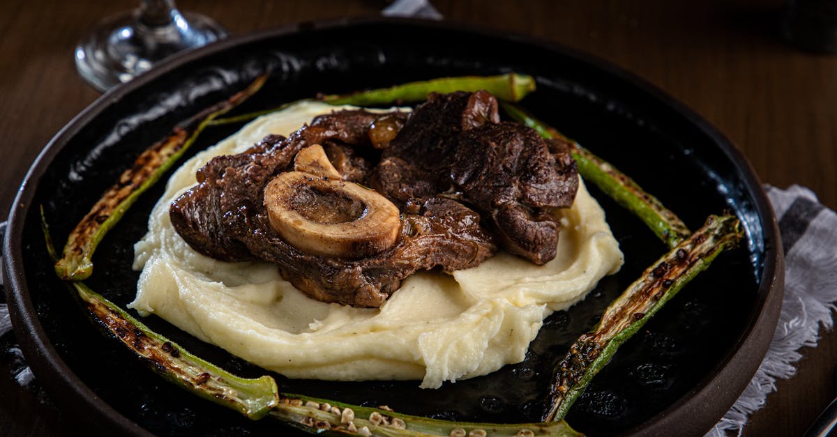 Photograph of a Steak on Mashed Potato · Free Stock Photo