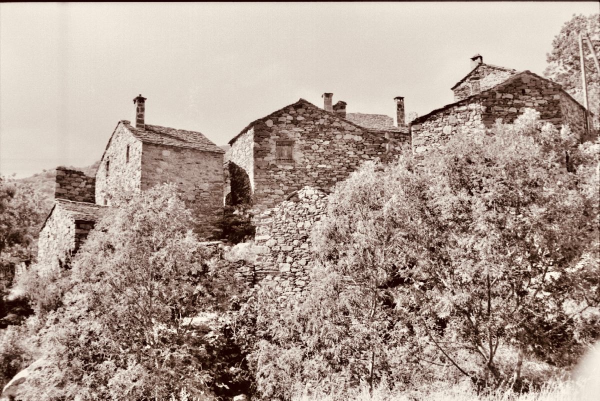 Stone houses photographed in sepia tones