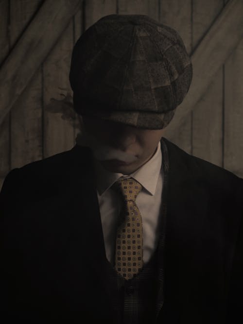 Man in Check Newsboy Cap 