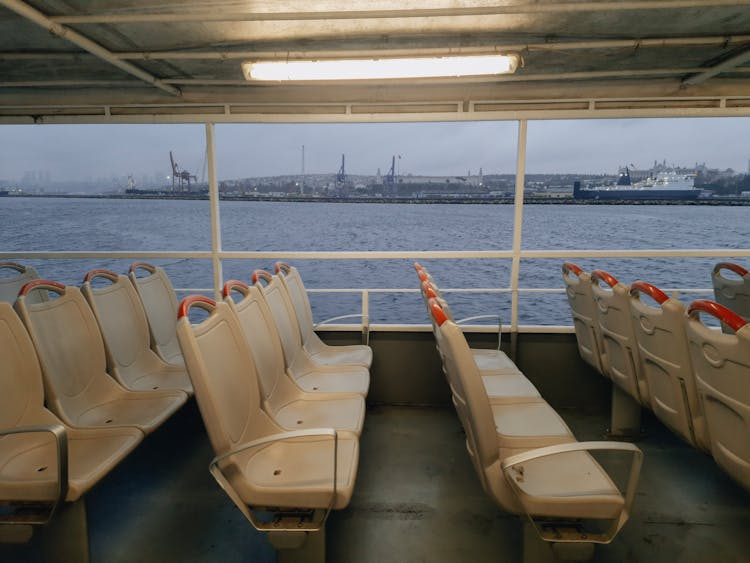 Empty Seats Of A Ferry On A River