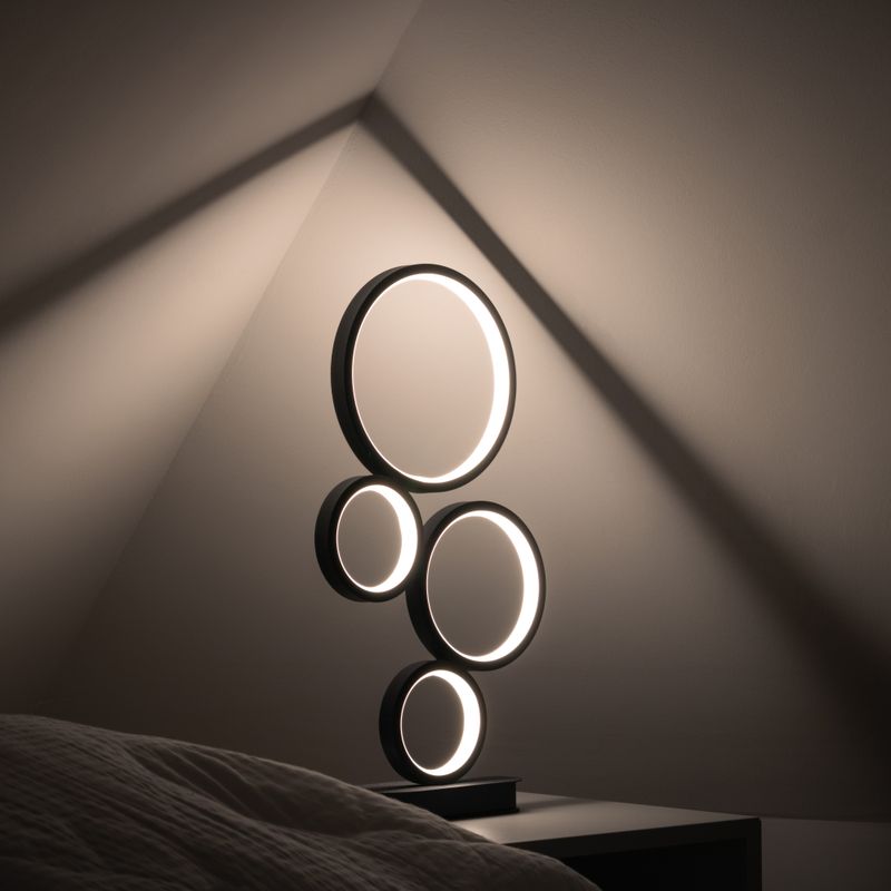 Circular lamp glowing against a wall — photo by Niklas Jeromin on Pexels