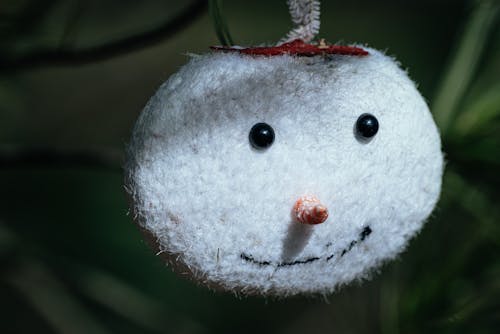 Close-up of a Christmas Ornament in a Shape of a Snowman 