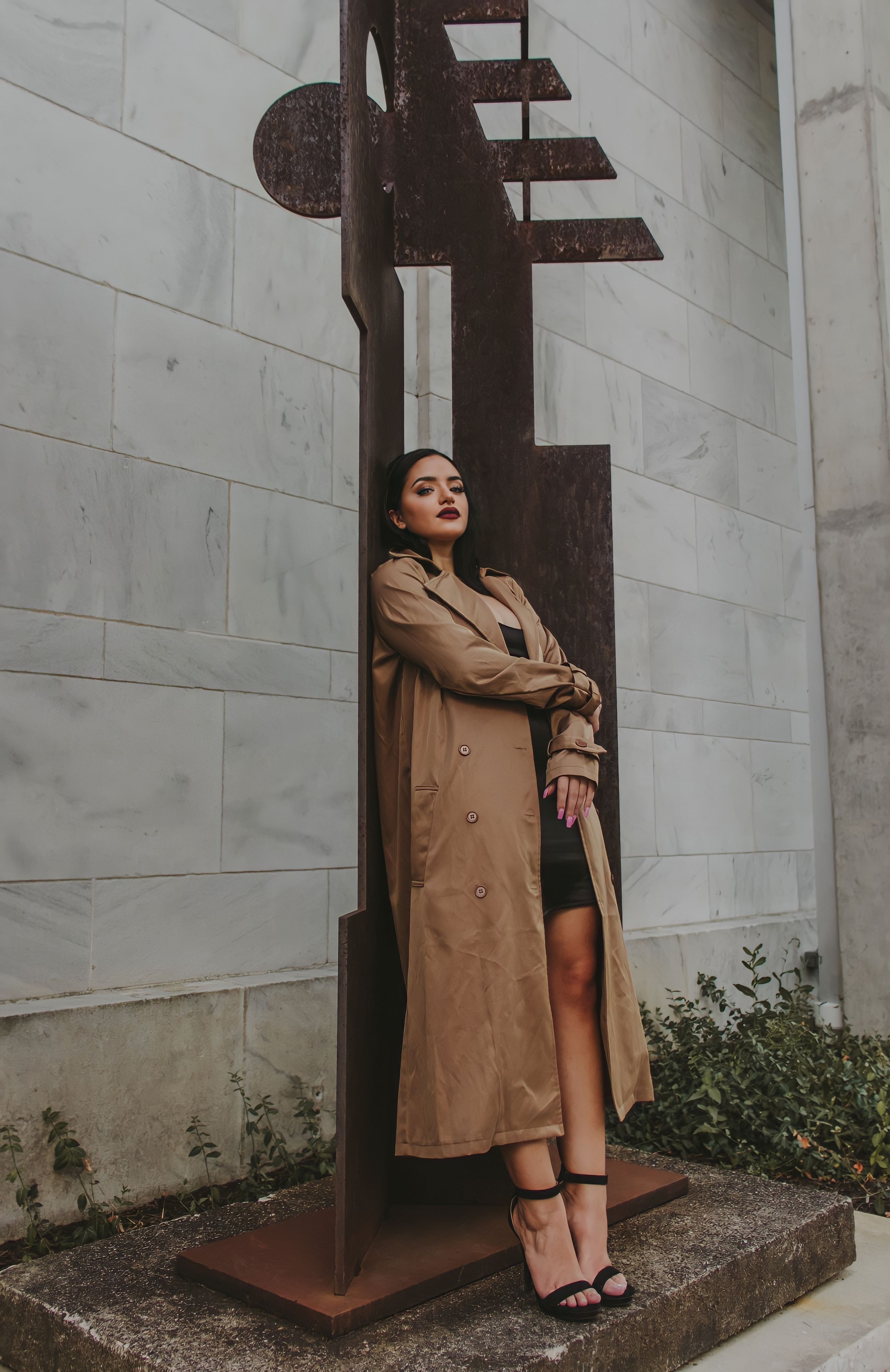 A Woman in Brown Coat Posing · Free Stock Photo