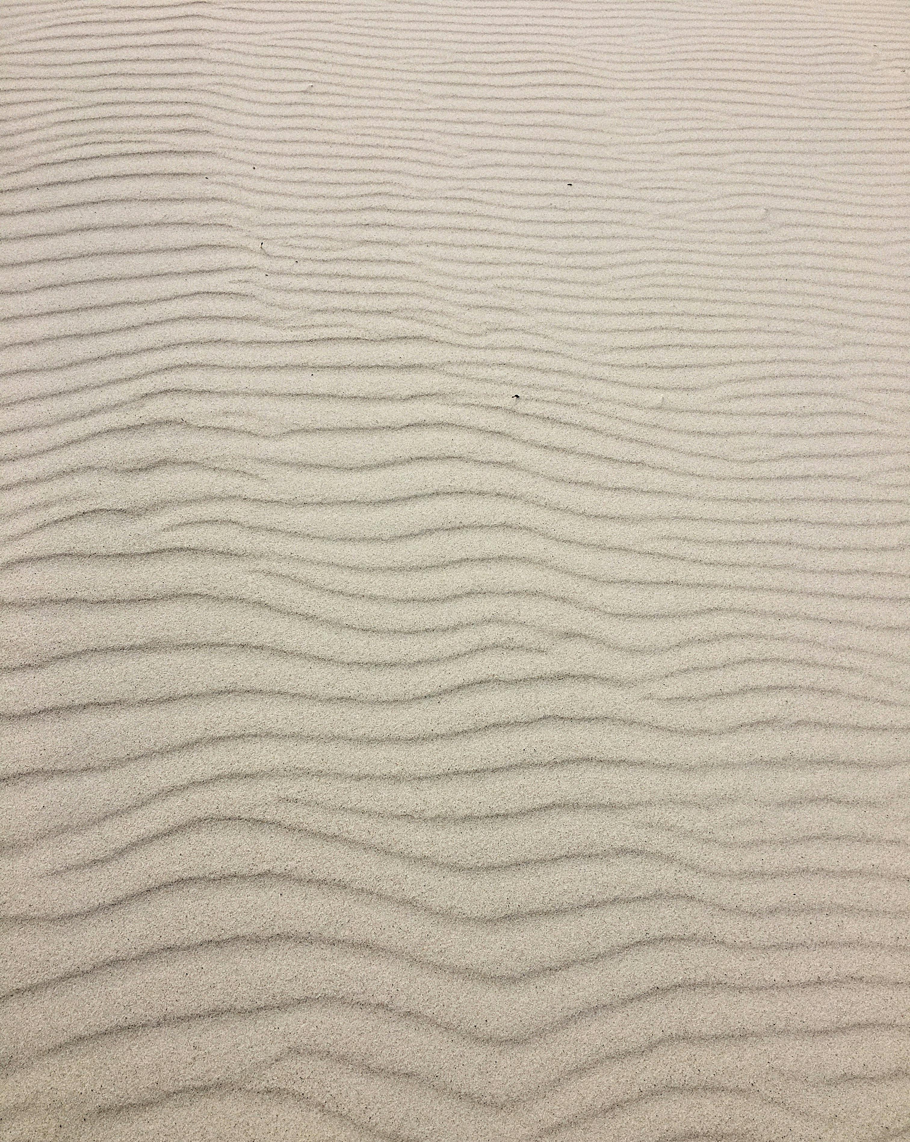 ripples in brown sand