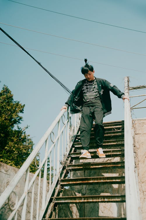 Man Walking Down Stairs