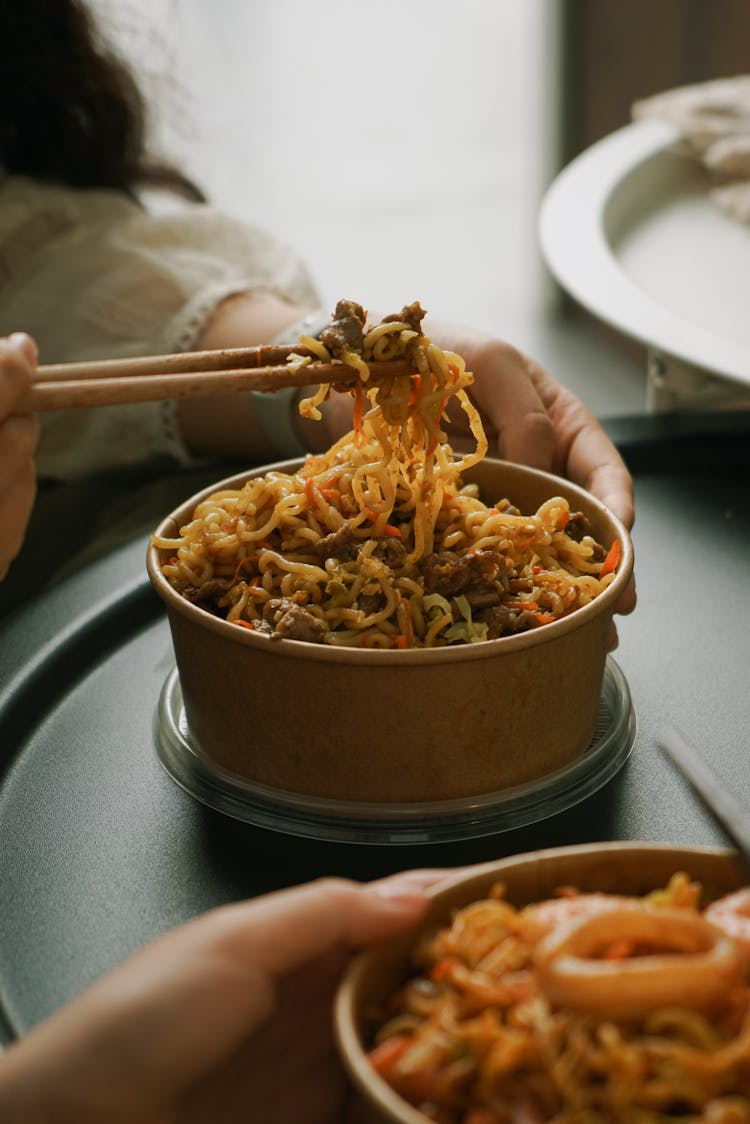 Bowls Of Soup With Noodles, Vegetables And Meat