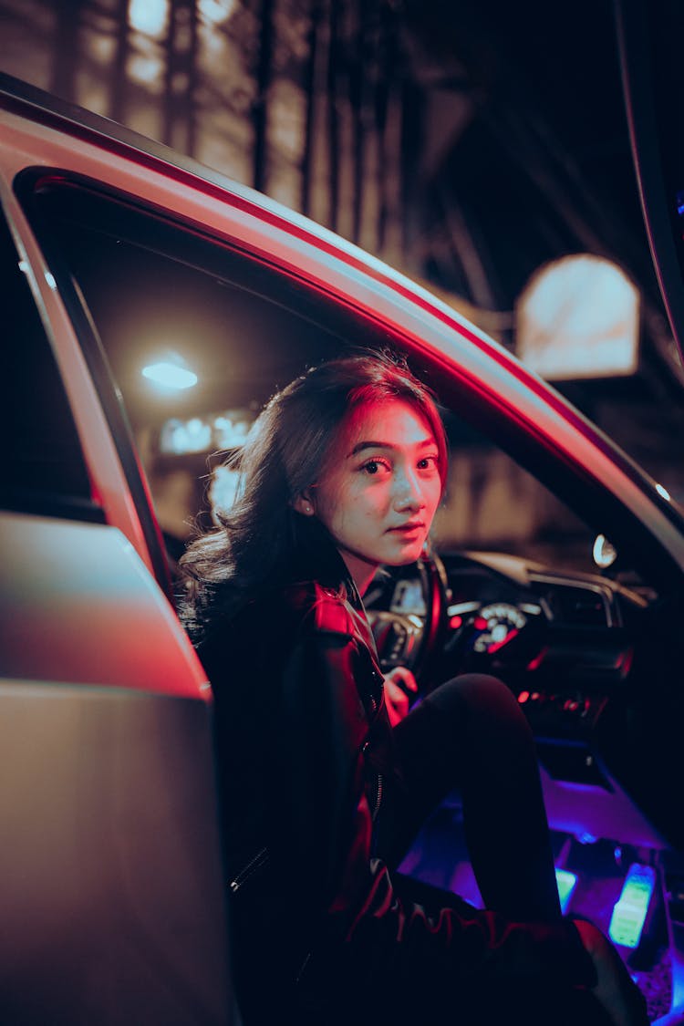 Woman Getting Off The Car