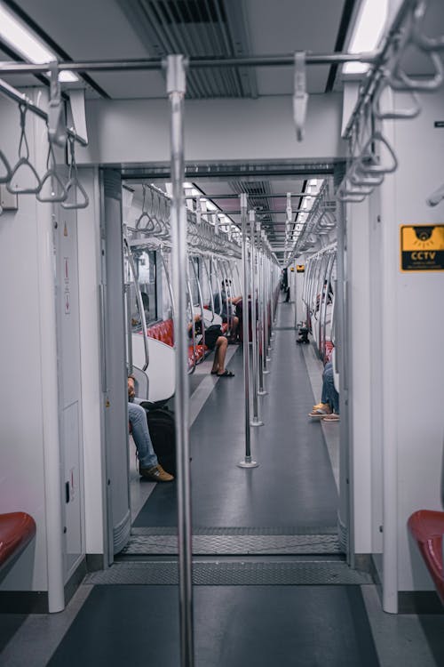 People Sitting in a Subway 