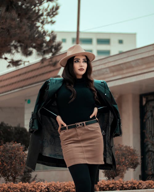 Young Woman in Fashionable Outfit Posing Outdoors 