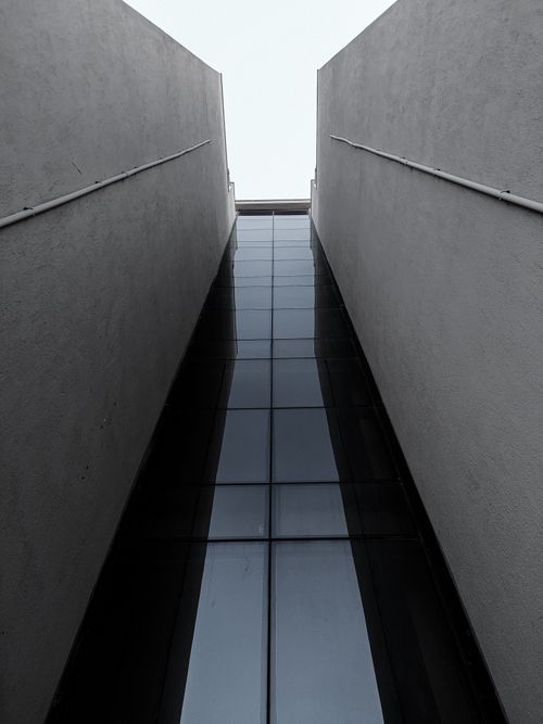 Free Low angle view of a modern building facade in Denizli, showcasing urban architectural lines. Stock Photo
