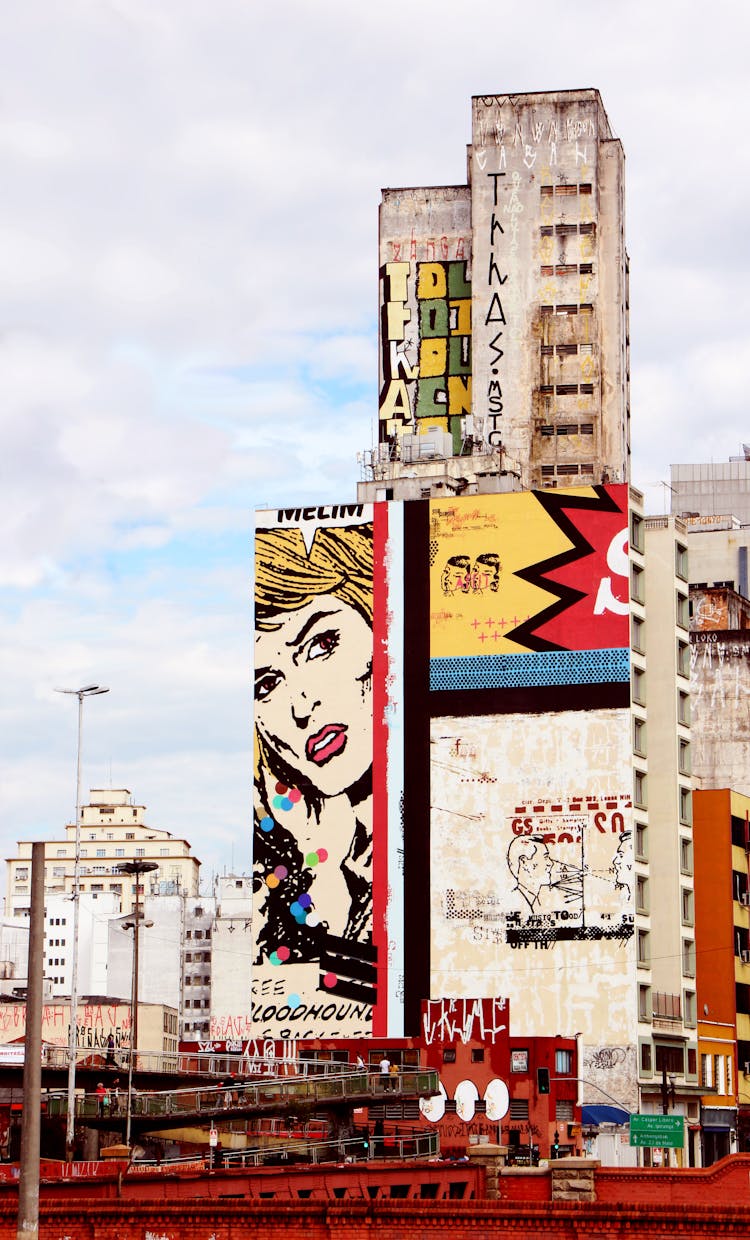 Graffiti On White Concrete Building