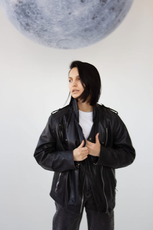 Studio Portrait of a Female Model Wearing a Black Leather Jacket