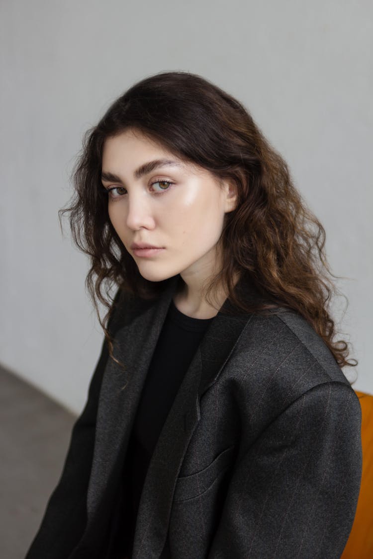 Portrait Of A Young Woman Wearing Black Oversize Jacket