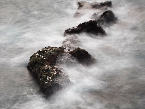 Waves Crashing on Rocks