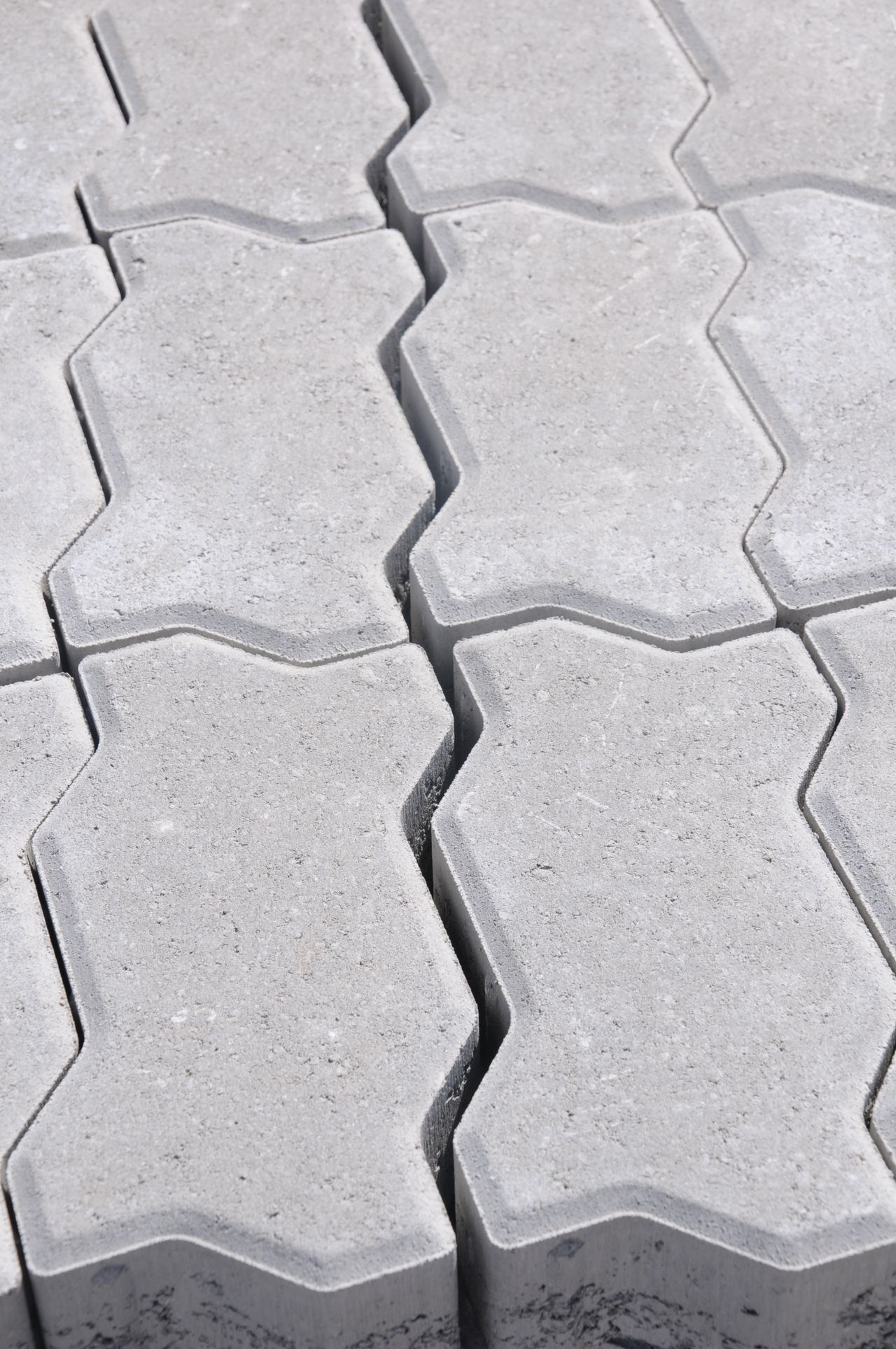 Close-up of grey interlocking concrete pavers