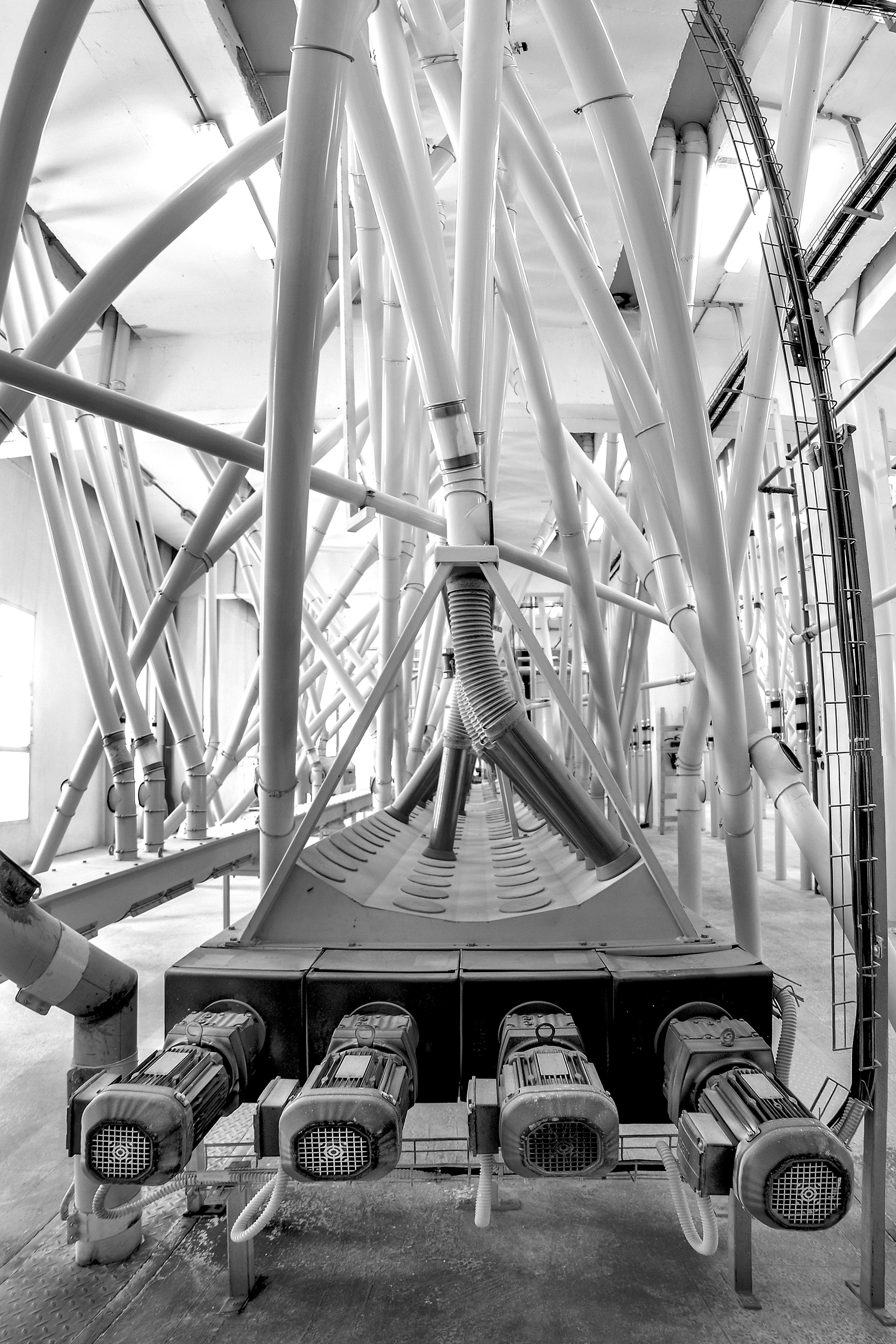 Complex industrial equipment utilizing advanced grease fittings