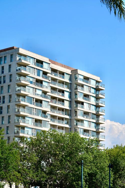 Free A modern apartment building surrounded by greenery in Tigre, Buenos Aires, Argentina. Stock Photo