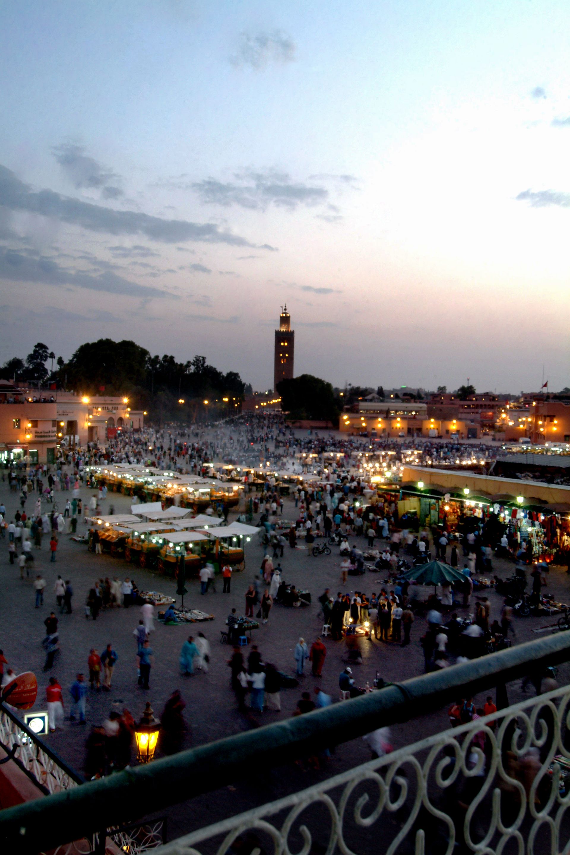 Jemaa el-Fna square at sunset with the Koutoubia Mosque, Marrakech