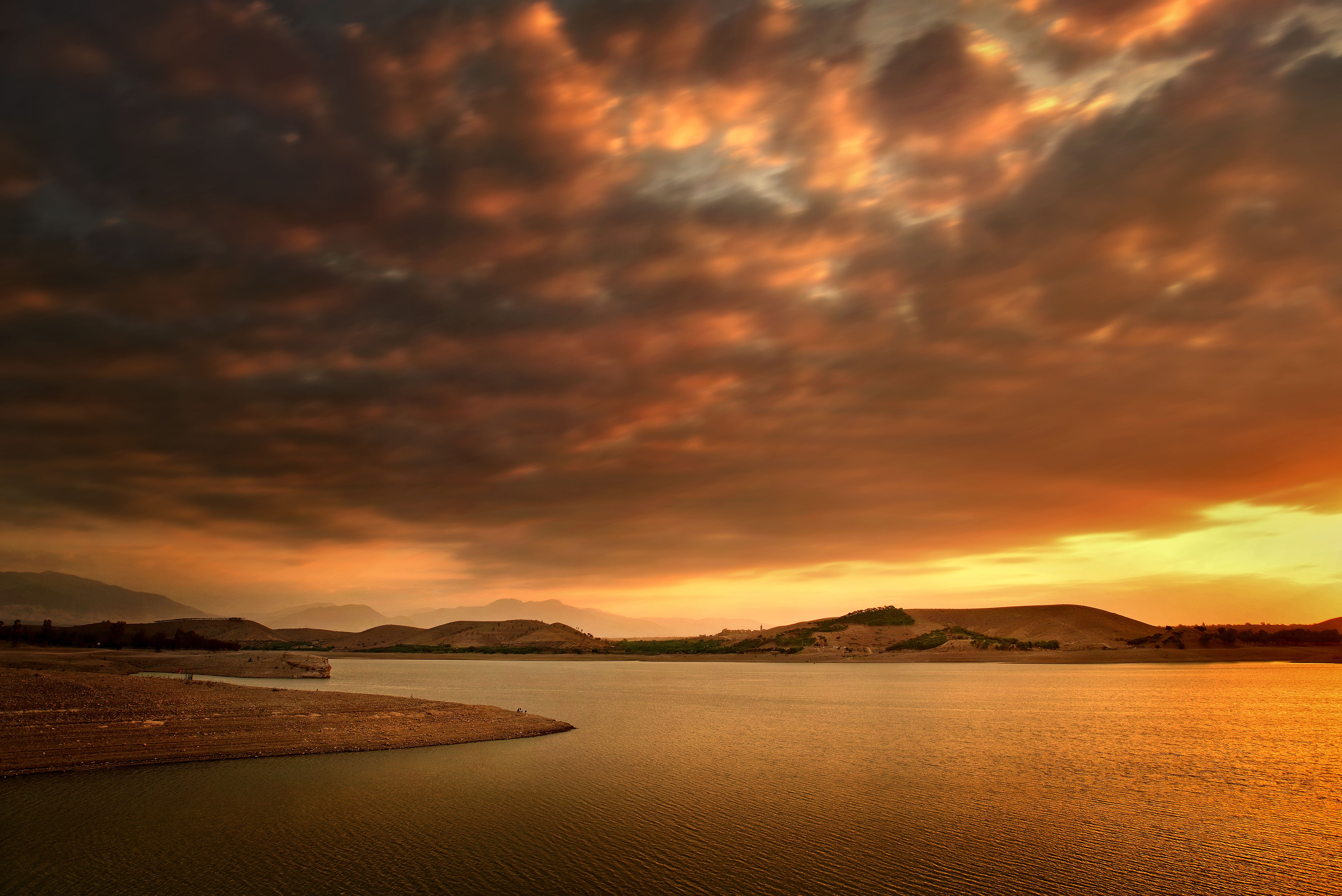 Clouds over Lake at Sunset · Free Stock Photo