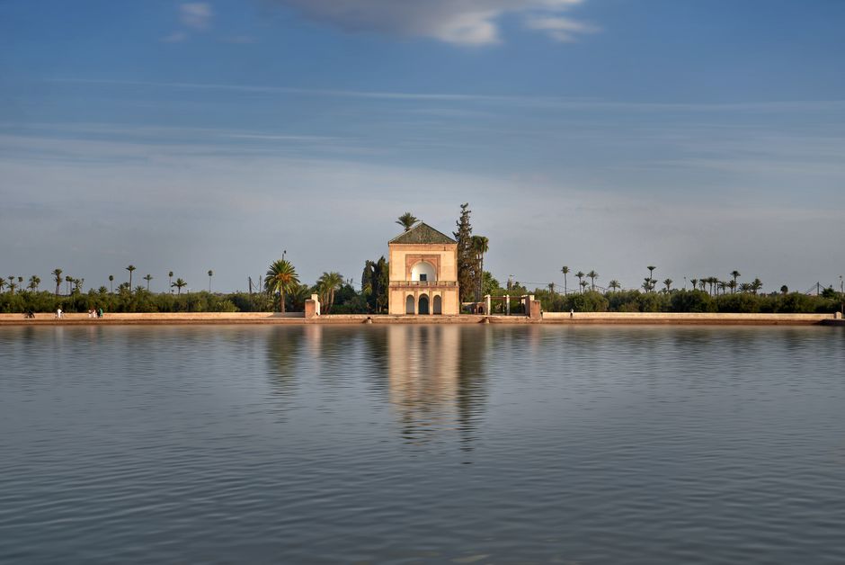 Exterior view of Marrakech Menara Airport with palm trees and modern architecture