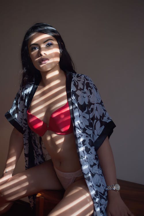 Woman Wearing a Robe Over her Lingerie