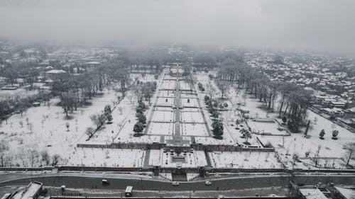 Park in a City Covered with Snow in Black and White 