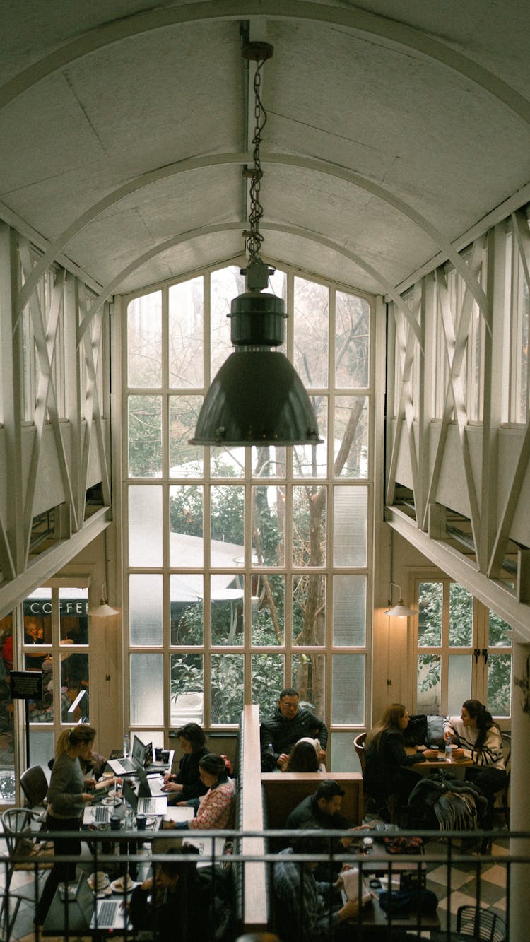 People Sitting In A Cafe